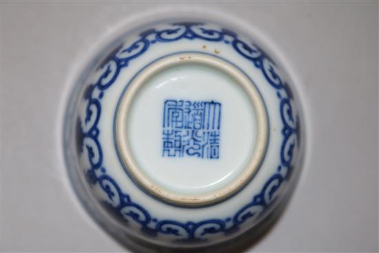 A Chinese blue and white Eight Buddhist emblems cup, bearing a Daoguang seal mark, diameter 7.3cm